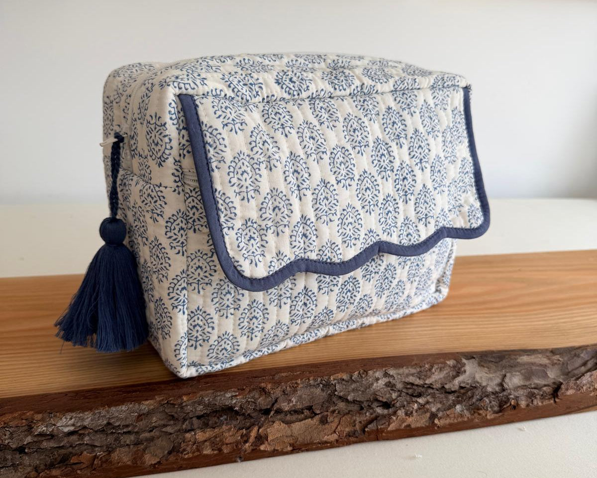 Indigo washbag with scalloped edging