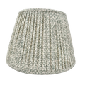 Textured lampshade with a geometric pattern on a white background