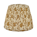 Decorative lampshade with brown floral pattern on a white background