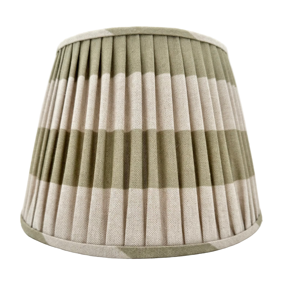 Checkered lampshade with green and beige pattern on a white background