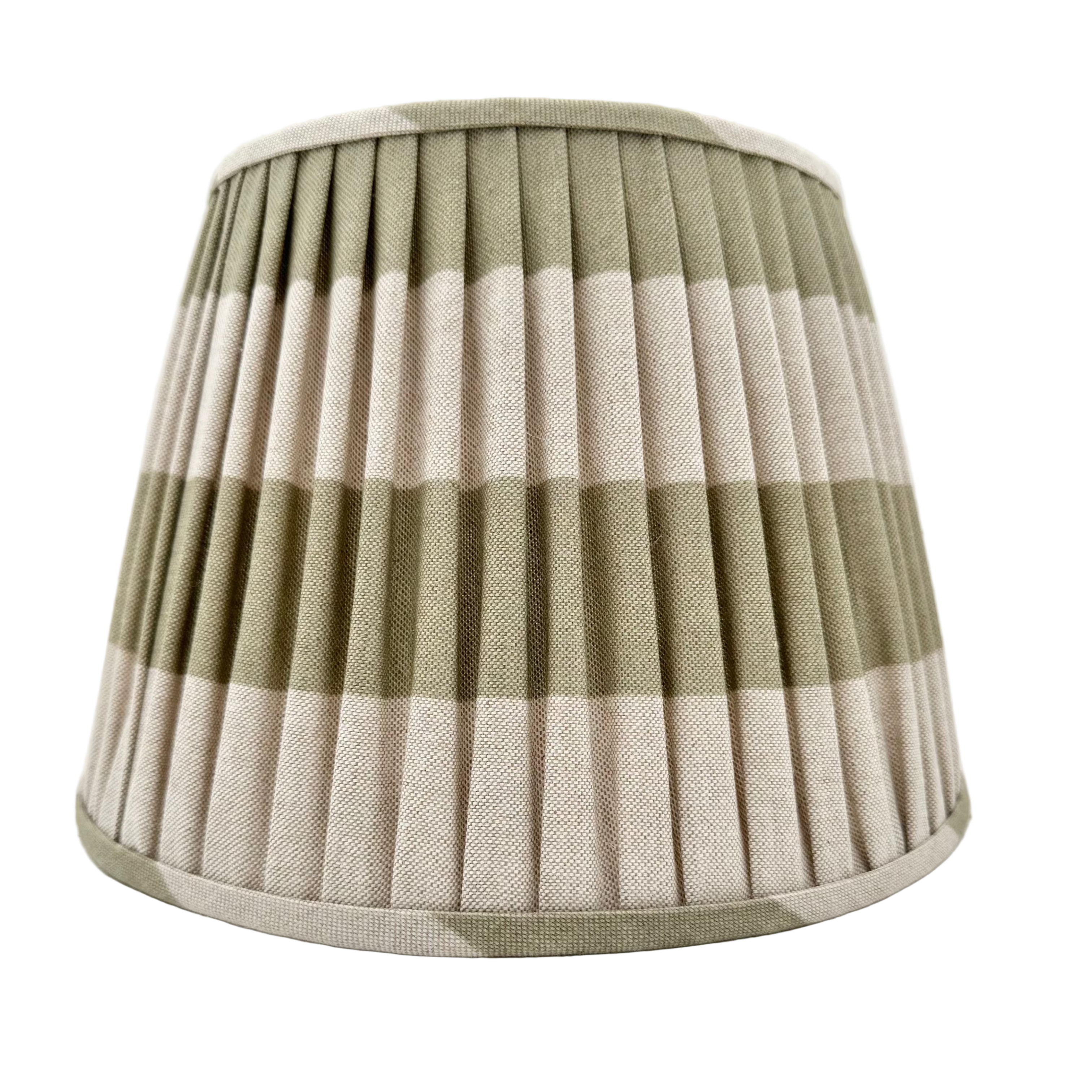 Checkered lampshade with green and beige pattern on a white background