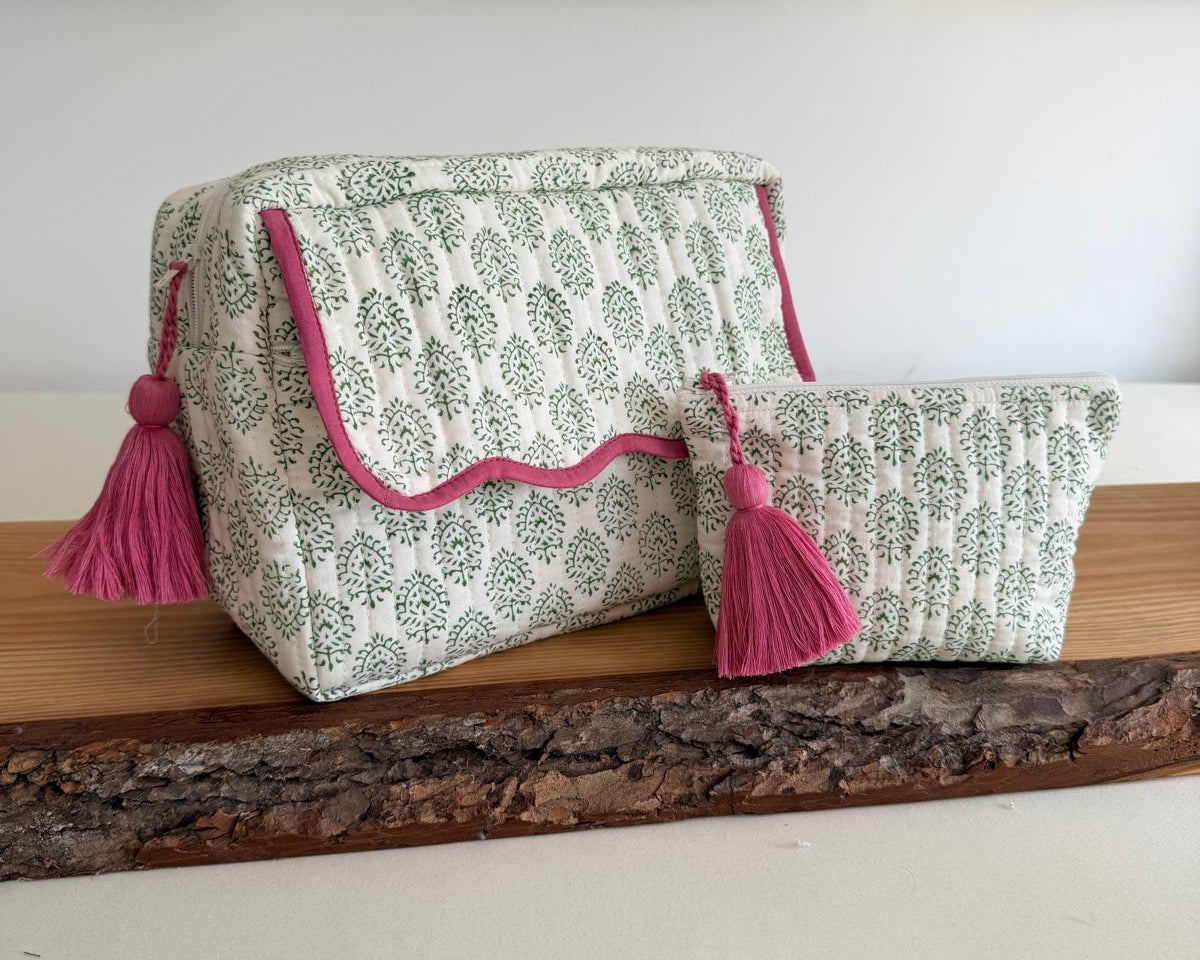 Green washbag with scalloped edging